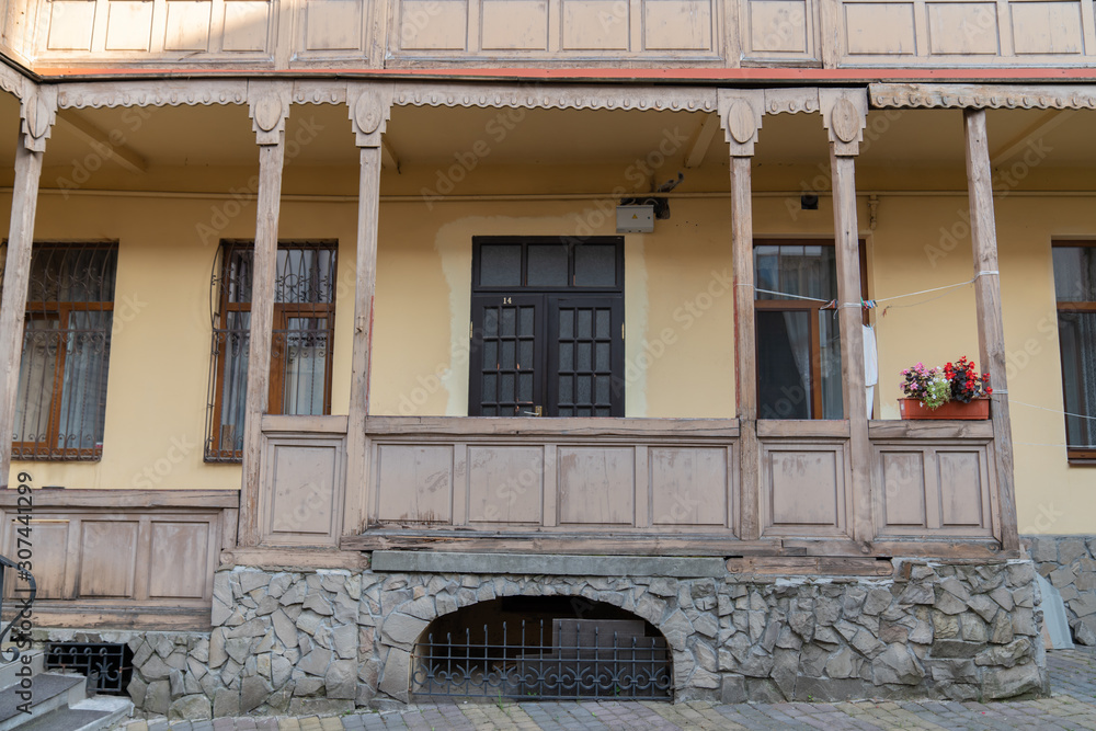 Wooden vintage old balcony built by Austrian architect