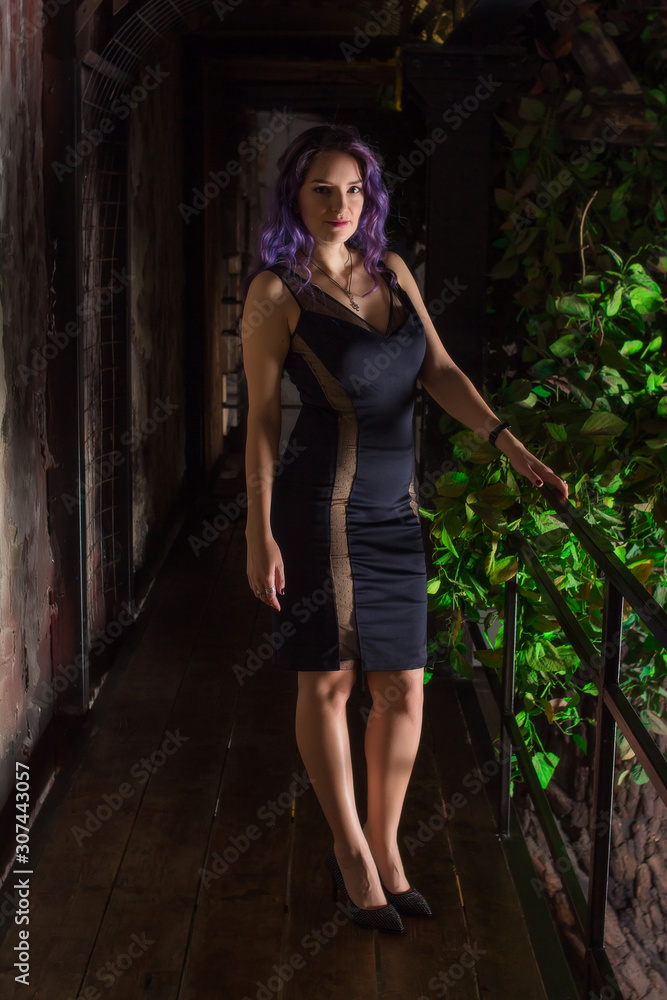 Naklejka premium portrait of young woman with colored hair