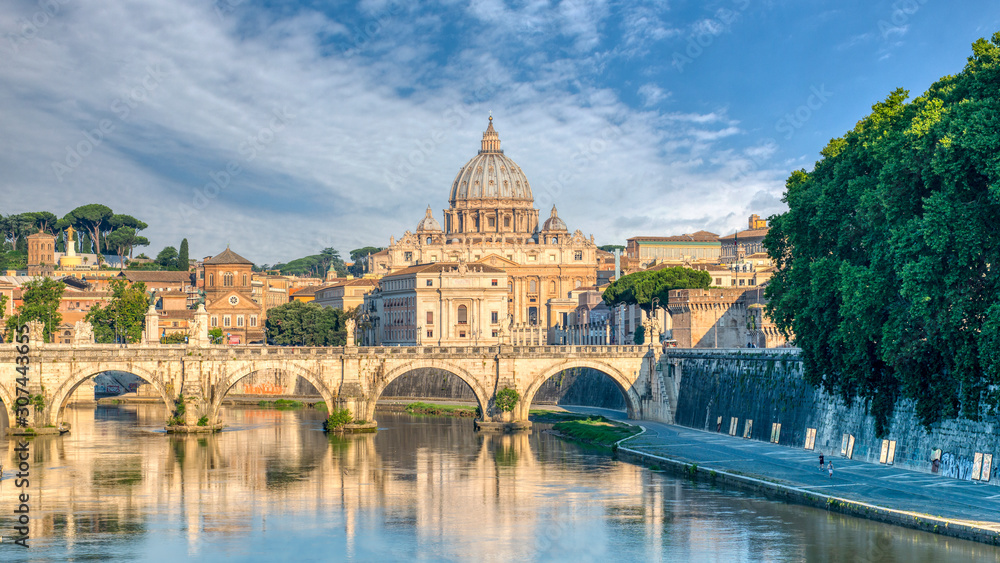 A morning shot of Ponte Sant Angelo and the Vatican in the background