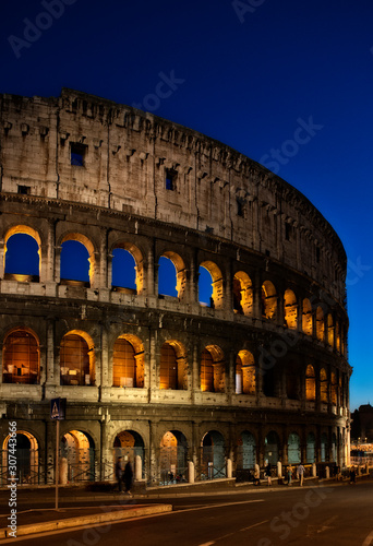 A shot of the Colosseum At dusk during blue light