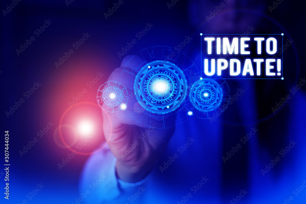 Text sign showing Time To Update. Business photo showcasing this is right moment to make something more modern new Woman wear formal work suit presenting presentation using smart device