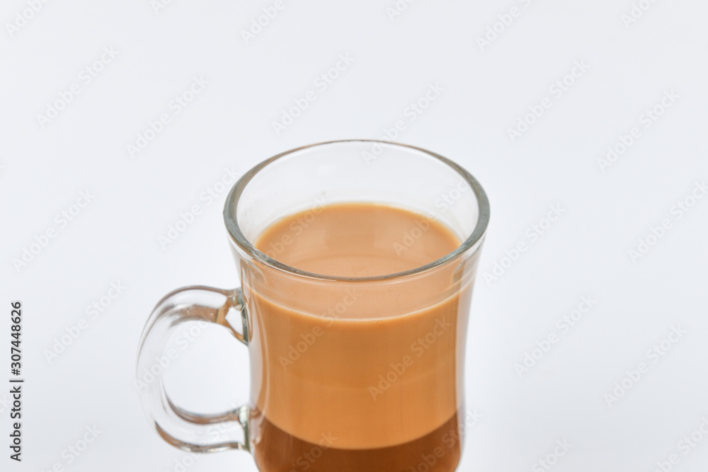 cocoa Poured into a glass transparent glass. Cocoa drink on a white background. cocoa Poured into a glass transparent glass. Cocoa drink on a white background.