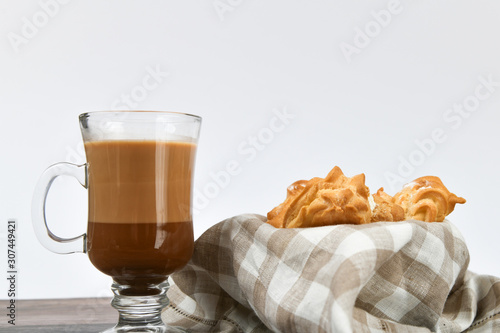 ocoa with cookies on a white background. A cup of delicious hot cocoa and cookies. photo