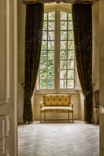 Antique windows in French chateau photo