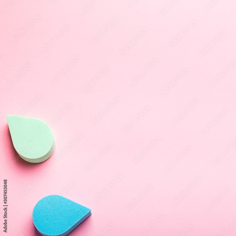 Beauty, make up sponges or beauty blenders in pastel colors on pink color background, copy space, top view. Beauty background Beauty, make up sponges or beauty blenders in pastel colors on pink color background, copy space, top view. Beauty background