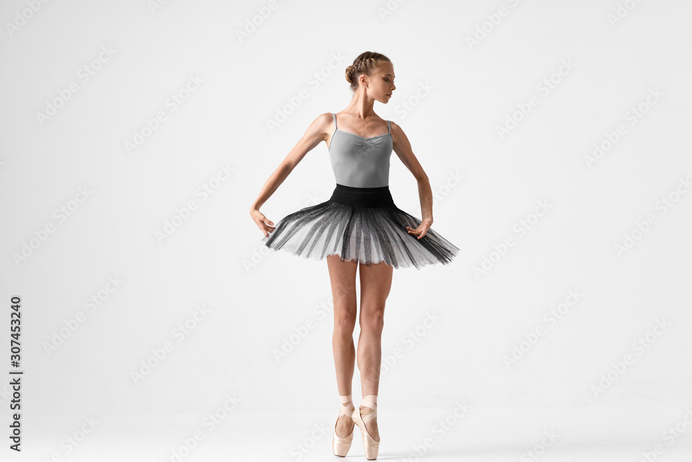 Fototapeta ballet dancer posing in studio