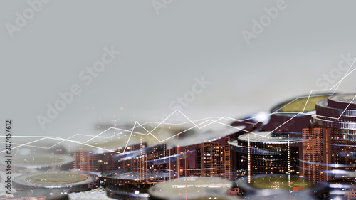 Double exposure of graph and rows of coins for finance and business concept, Stock market or forex trading and candlestick chart suitable for financial investment concept. Economy trends, SME.