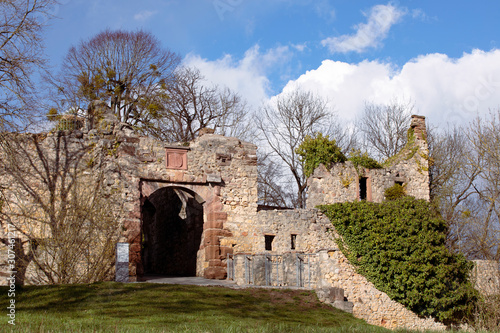 Enter gate of R  tteln Castle  Burg R  tteln  in L  rrach. Ruins of the medieval castle  Baden-W  rttemberg. Stone wall of German castle  Historic fortress  11th century. Blue sky.