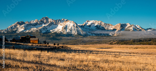 Sawtooth mountains in Idaho with house in foreground © Jim