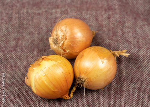 onions on wooden background