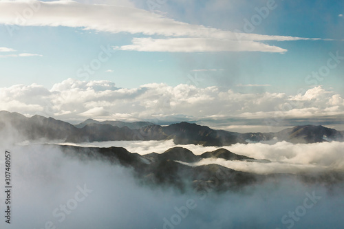 Mountains in clouds photo