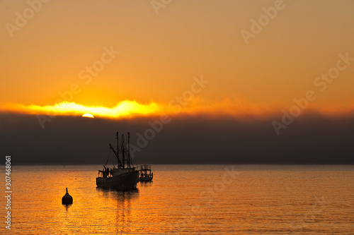 Fishing Boat At Sunrise © Steve Gadomski