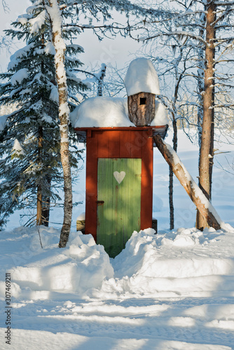 Outhouse at winter photo