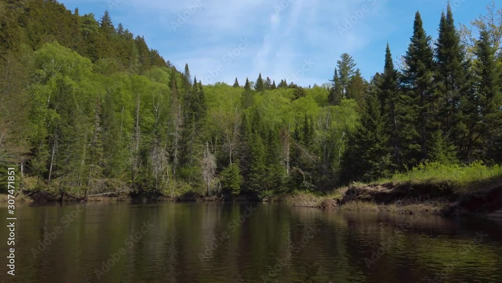 Kayak river trip through Mont Tremblant National Park forest in Quebec, Canada Kayak river trip through Mont Tremblant National Park forest in Quebec, Canada