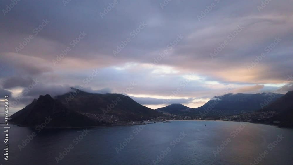 Colorful sunset at Hout Bay seen from Chapman's Peak, slow pan Colorful sunset at Hout Bay seen from Chapman's Peak, slow pan