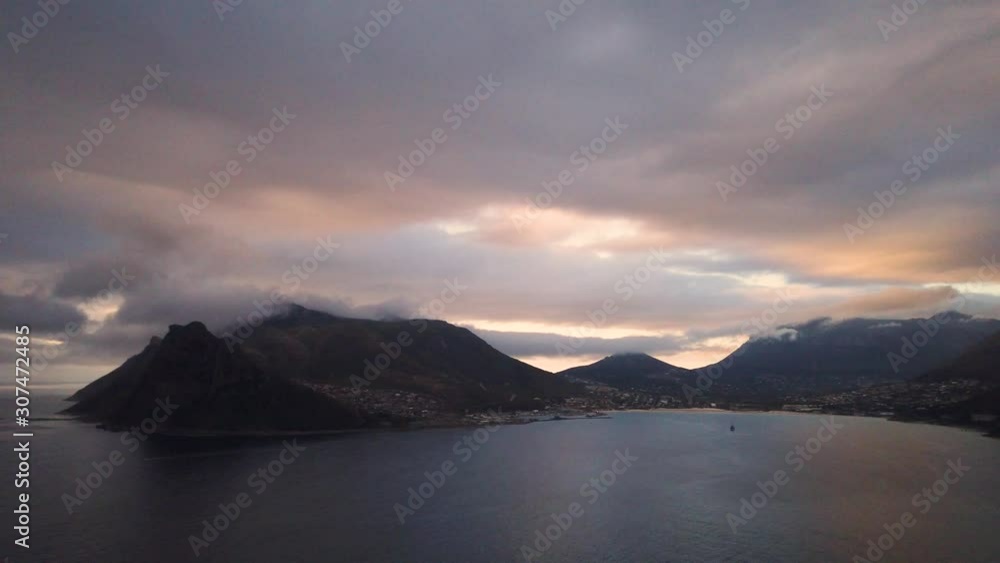 Colorful sunset at Hout Bay seen from Chapman's peak, slow pan Colorful sunset at Hout Bay seen from Chapman's peak, slow pan