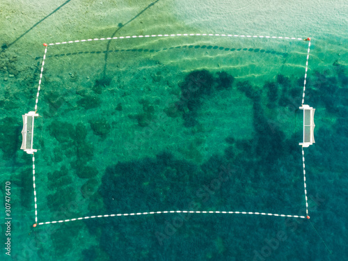 Aerial view of water polo field at transparent water, Sumartin, Croatia.