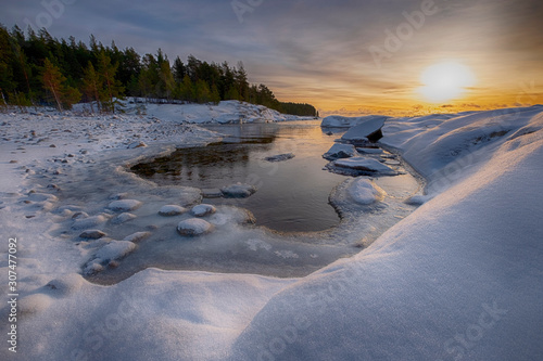 winter sunrise on the lake Ladoga island Kajosaari Republic of Karelia