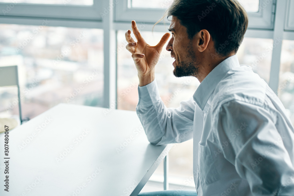 businessman looking at digital tablet in office businessman looking at digital tablet in office