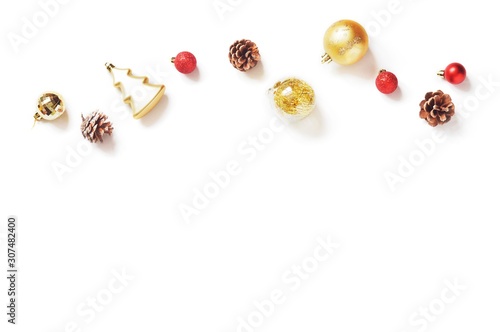 Christmas Ornament, New Year decoration. Gold, red baubles and pine cones on a white background. Mockup, free space for text