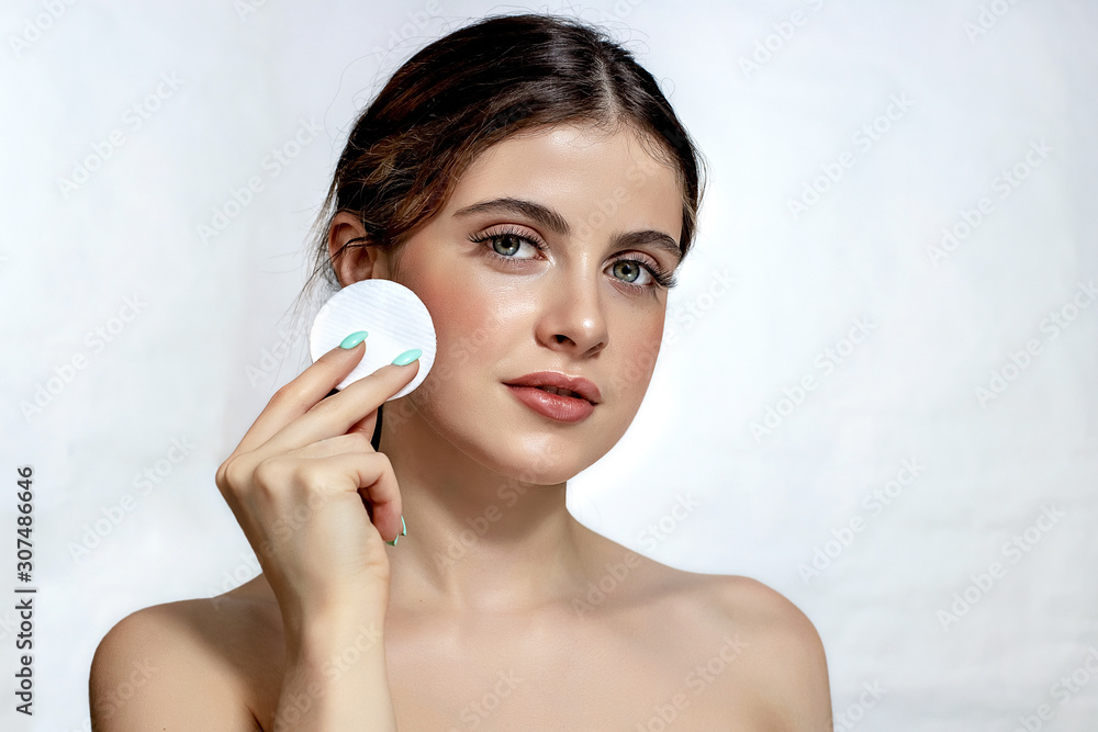 Beautiful young woman with clean perfect skin. Beautiful young woman with clean perfect skin.