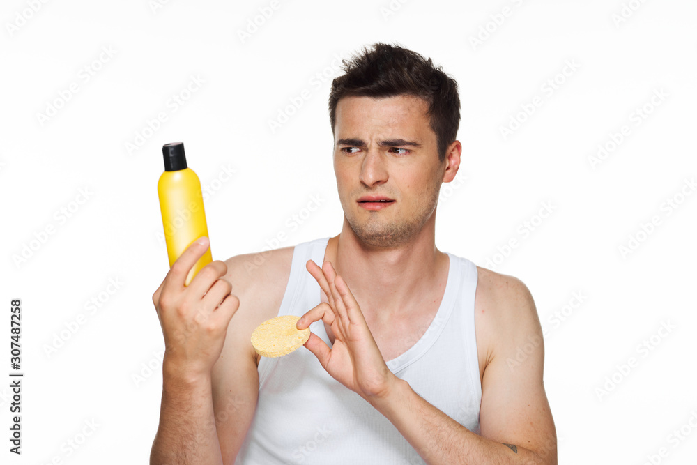 young man drinking orange juice young man drinking orange juice