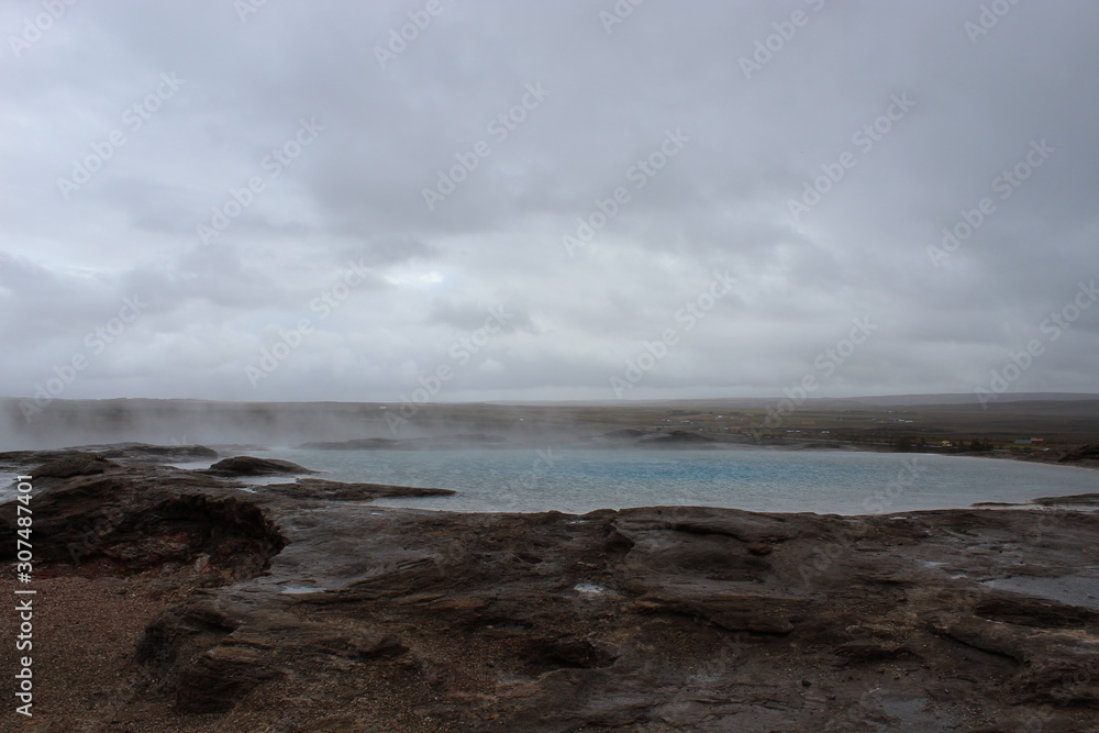 The original geysir in Iceland on a cloudy day The original geysir in Iceland on a cloudy day