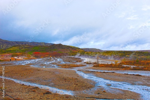 The original geysir in Iceland on a cloudy day