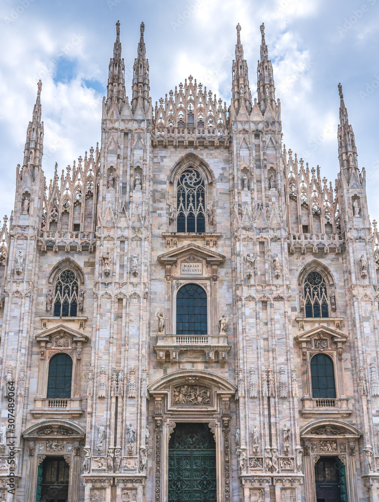 Milan Cathedral in Italy, known as Duomo di Milano is the largest and most complex Gothic building in Italy. Catholic church made of white marble.