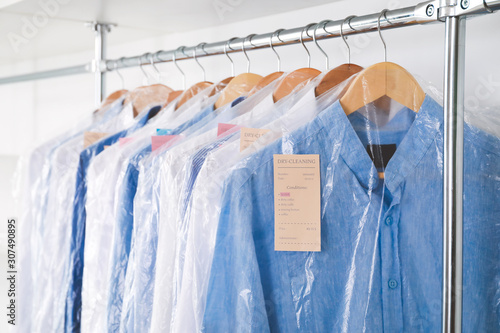 Rack with clothes in modern...