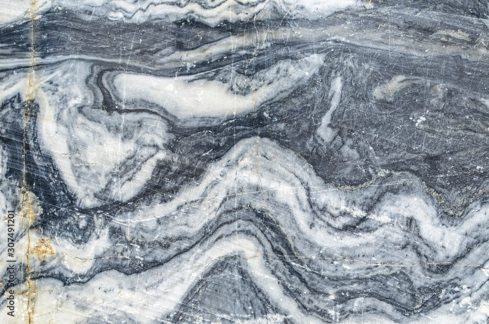 Texture of white and gray marble. Rough stone surface. Monochrome background.Marble wall. Texture of white and gray marble. Rough stone surface. Monochrome background.Marble wall.