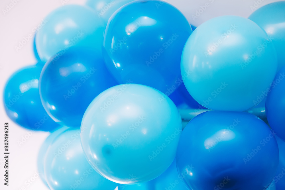 closeup of blue balloons on a white background. balloons birthda