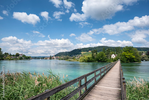 Wallpaper Mural Diminishing perspective of footbridge over Rhine river at Werd Island, Switzerland Torontodigital.ca