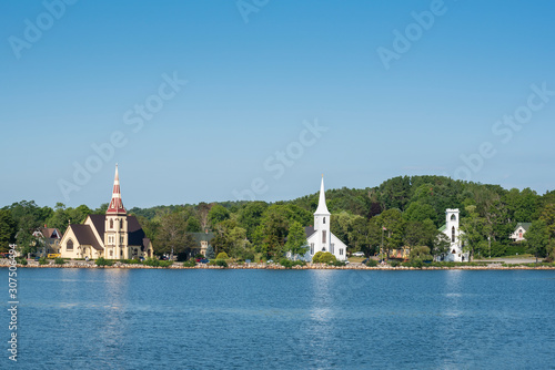 Canada, Nova Scotia, Lunenburg County, Mahone Bay, view across bay with three churches United Mahone Bay Church, St Johns Lutheran Church and St James Anglican Church photo