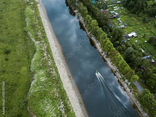 Aerial view of boat moving on Ladoga canals at Shlisselburg, Russia photo