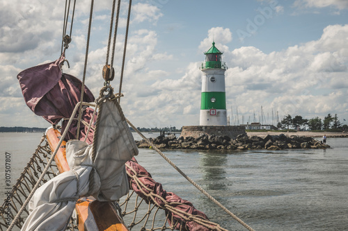 Germany, Schleswig-Holstein, Schleimunde lighthouse seen from gaff schooner boat