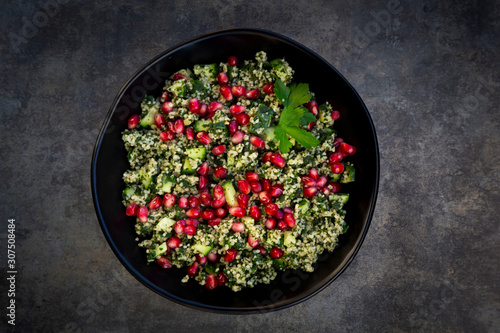 Directly above shot of pomegranate salad served in plate on table photo