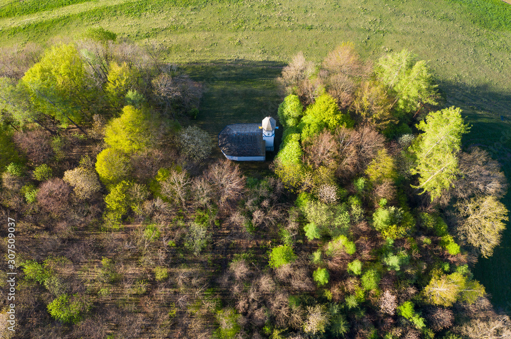Aerial view of Chapel St. Georg amidst trees, Ascholding, Germany Aerial view of Chapel St. Georg amidst trees, Ascholding, Germany