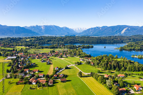 Idyllic view of village at by Staffelsee lake at Seehausen against clear blue sky, Germany photo