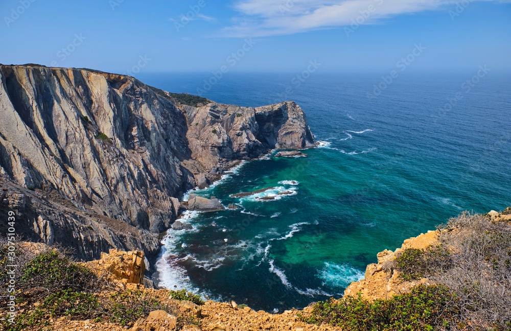 Portugal, Algarve, Vila do Bispo, cliffs overlooking tranquil sea