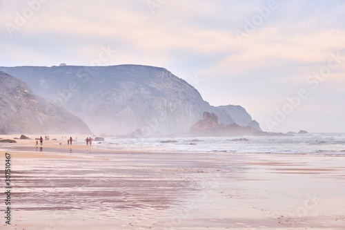 Portugal, Algarve, Cordoama?beach with cliff in background photo
