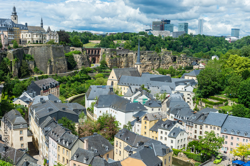 High angle view of old town in Luxembourg against cloudy sky photo