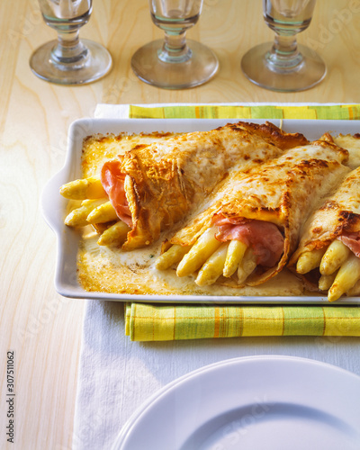 Crespelle stuffed with asparagus and ham photo