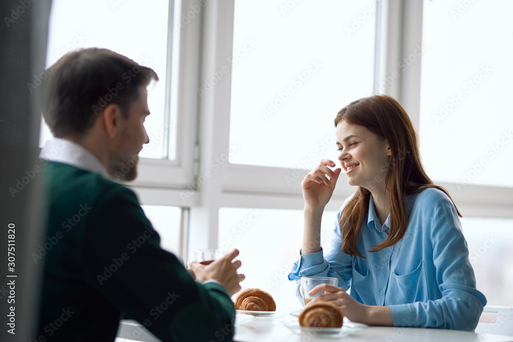 young couple having breakfast at home young couple having breakfast at home