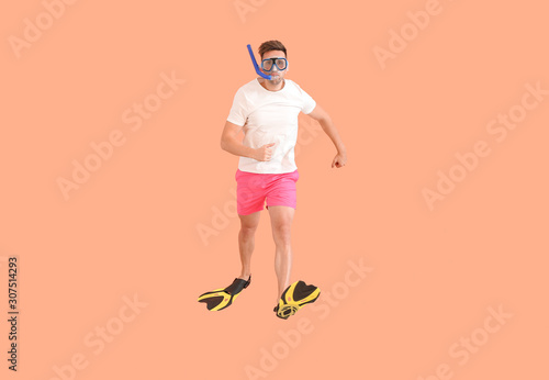 Jumping man in paddles and ...