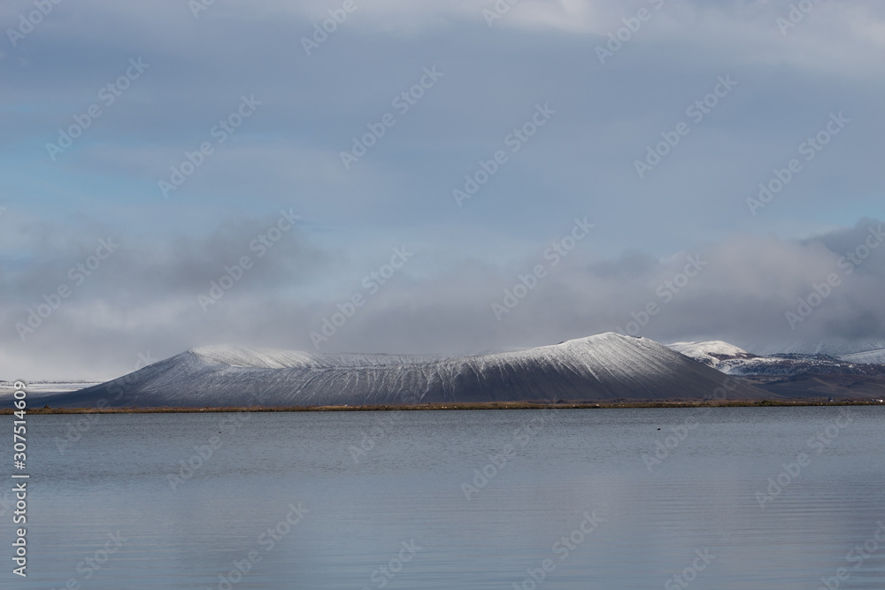 lake view of Hverfjall Crater with snow