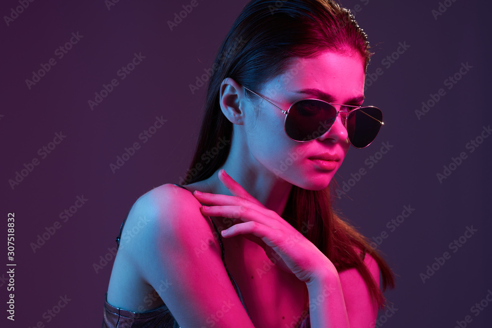 portrait of young woman in sunglasses portrait of young woman in sunglasses