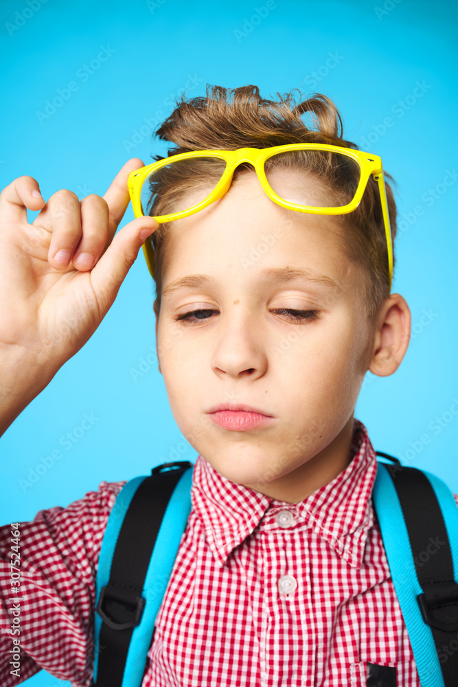 portrait of a boy in glasses portrait of a boy in glasses