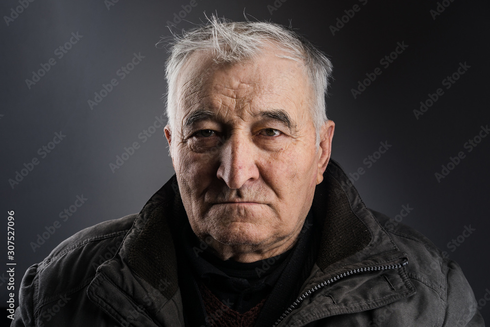 Senior man portrait in studio 80 years old man caucasian with gray white hair Senior man portrait in studio 80 years old man caucasian with gray white hair