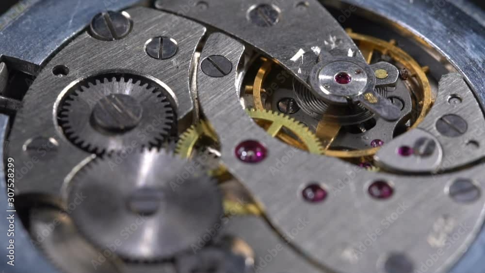 The working mechanism of the old retro pocket watch of the times of the USSR. Close-up Slow motion The working mechanism of the old retro pocket watch of the times of the USSR. Close-up Slow motion